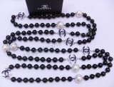 Chanel Black / White Pearl Necklace Réplica